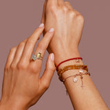 Korallenarmband „Trust“ mit Schutzstein Koralle und  rosé vergoldetem Elefanten aus Sterlingsilber – für Vertrauen, Optimismus und innere Stärke. Handgefertigt in Hamburg.