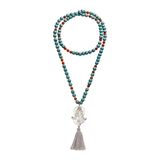 Karneol Mala für Energie & Balance. Holzperlen erden, Ganesha-Silberanhänger stärkt Mut und Neuanfang. Dein spiritueller Power-Begleiter.