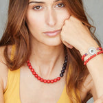 Edelsteinkette aus roter Koralle und lila Amethyst Edelsteinen.