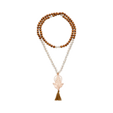 Mala Kette mit echten Perlen und Sandelholz und Ganesha Anhänger.