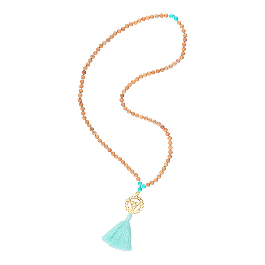 Mala Kette mit Halschakra Anhänger aus Messing und Türkis Edelsteinen und Bommel.