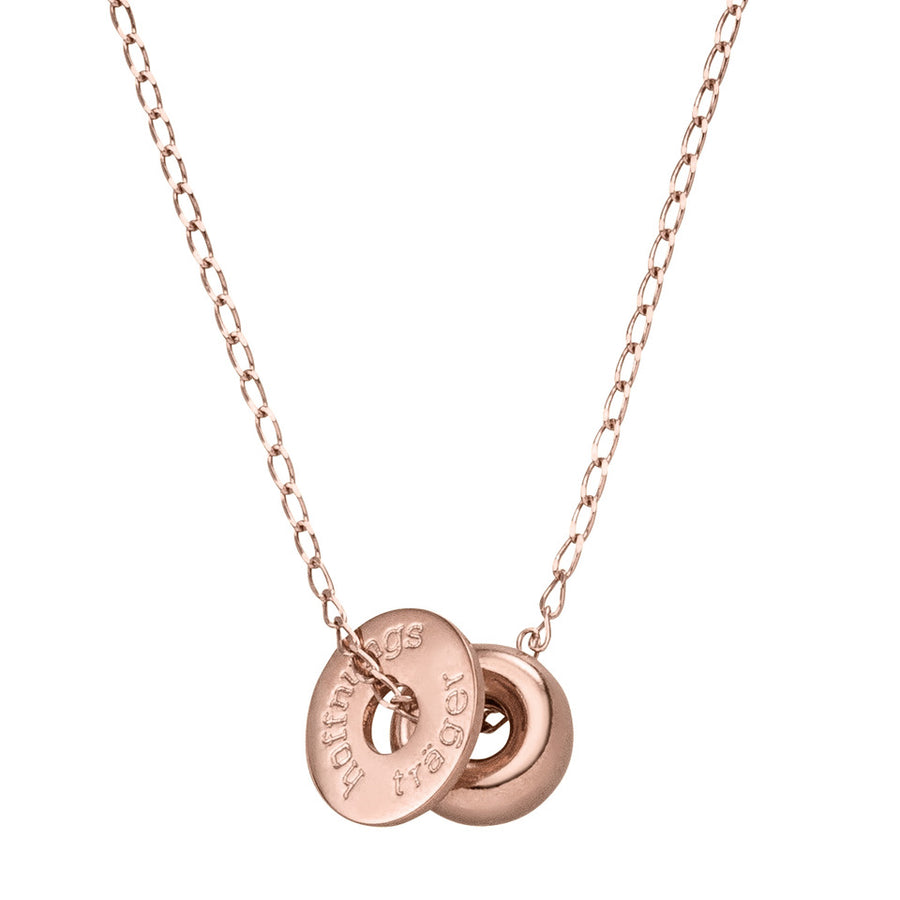Roségoldene Donut Kette mit Glücksbringer Anhänger.